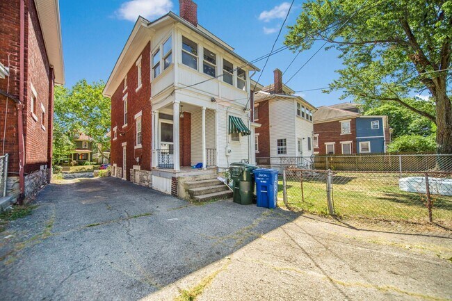Building Photo - Charming 5-Bedroom Home with Exposed Brick and Modern Upgrades