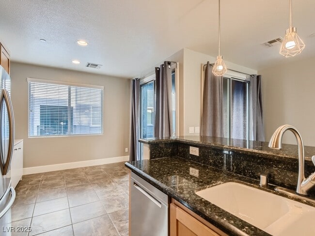 Building Photo - 9050 W Tropicana Ave