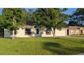 Building Photo - House in North Palm Coast, FL MOVE IN INCE...