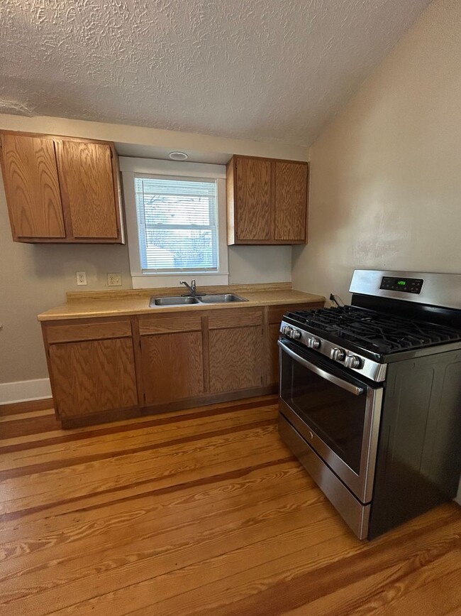 Building Photo - Charming 2-Bedroom Home Between Dundee & Blackstone with Large Attached Garage & Hardwood Floors