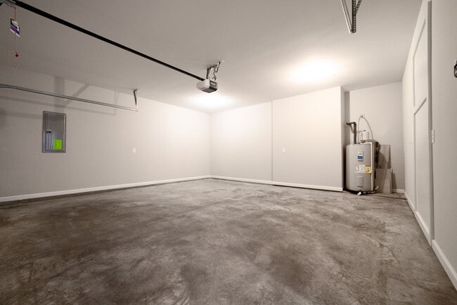 Building Photo - Elegant Home with Stone Fireplace, Kitchen Island and Designer Primary Suite