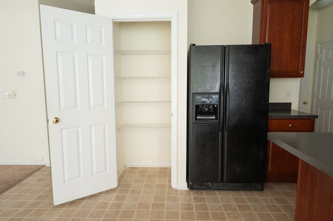 Building Photo - Spacious beautiful 4 bedroom 2.5 bath home  In Greensboro with an office/upstairs loft/ sunroom/ ...