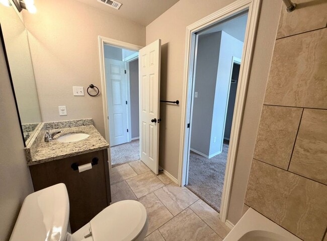 Building Photo - Corner Unit Townhome with 3 Bedrooms, Garage & Private Yard