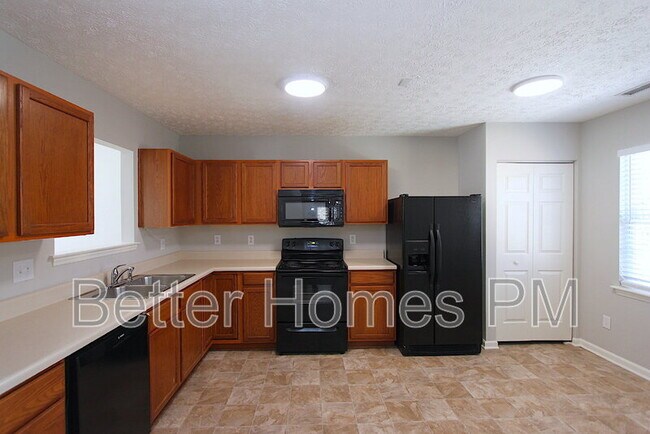 Building Photo - 3208 Mango Dr