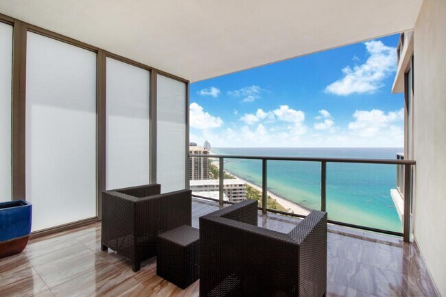 Building Photo - 9703 Collins Ave