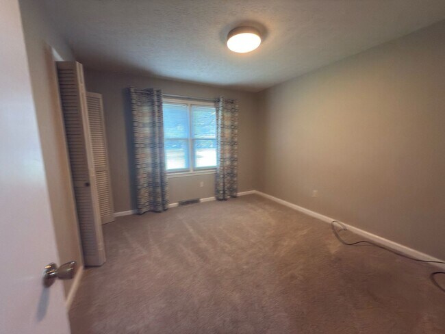 Building Photo - Spacious three bedroom, two bathroom with ...