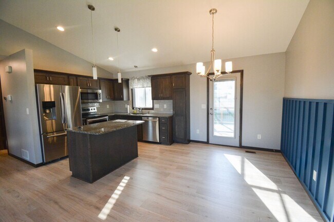 Building Photo - Remodeled 4-Bedroom Home for Rent with Garage & Deck