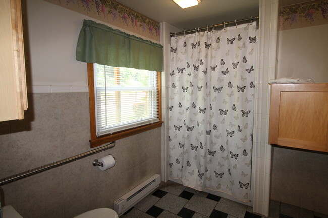 En suite bathroom to the king bedroom - 2820 NY-28