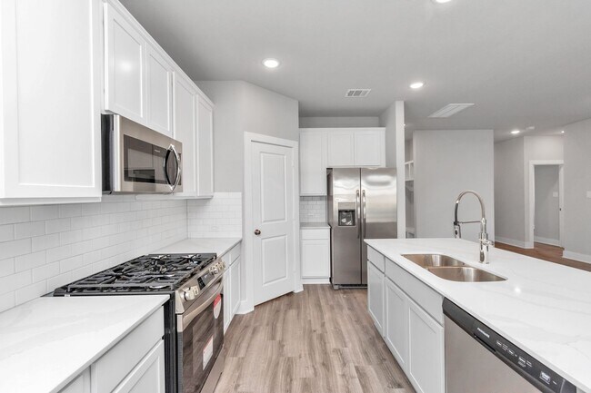 Building Photo - Welcome to the Holly — Spacious Comfort, Modern Style.