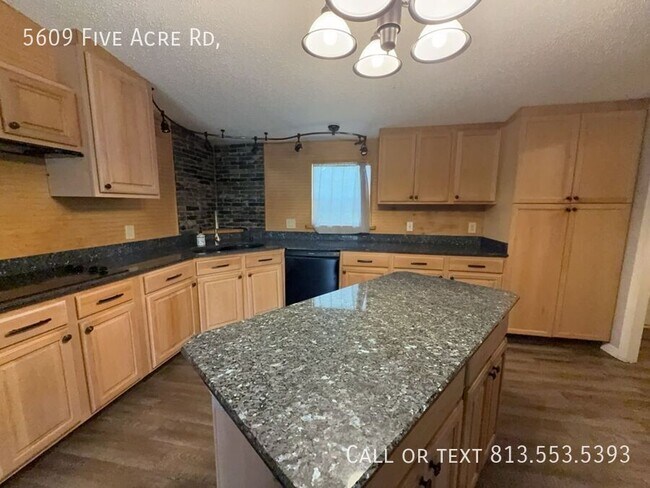 Building Photo - 5609 Five Acre Rd