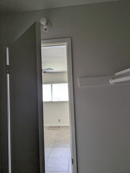 Master Walk in closet looking into master bedroom - 4435 Bonnie Brae St