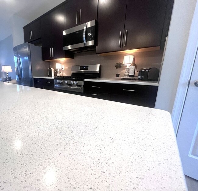 Building Photo - Executive Townhome in Preston Lakes