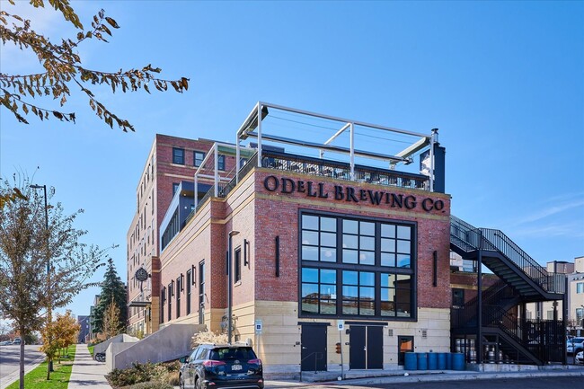 Building Photo - Modern 4-Bedroom Townhome with Rooftop Deck Near Sloan’s Lake & Light Rail