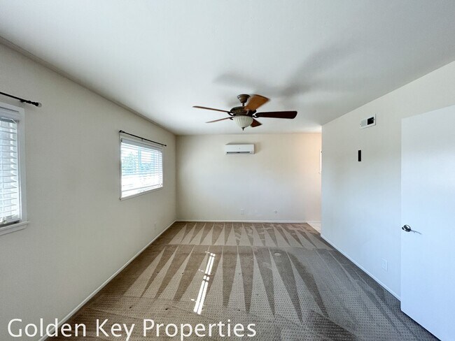 Building Photo - Welcome to this stunning 4-bedroom, 2.5-ba...