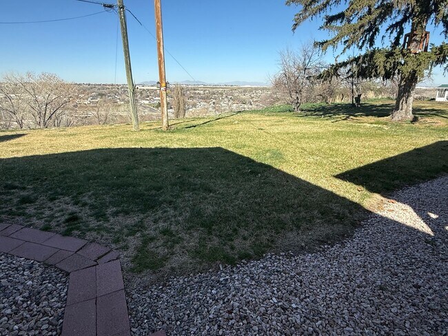 Building Photo - Beautifully updated duplex with parking and a storage shed