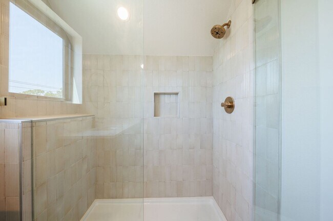 Building Photo - Luxury Redefined: Experience Vibrant Living in this 3-Bedroom Haven in East Austin