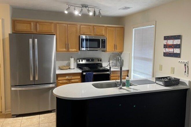 Full kitchen with quartz and new stainless appliances - 535 W Glenn Ave