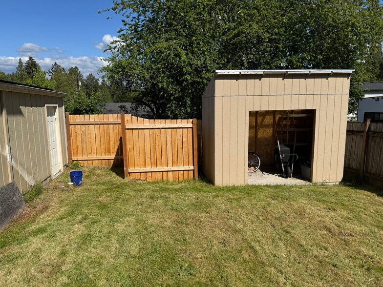 Covered shed and gate to alley - 13016 16th St NE