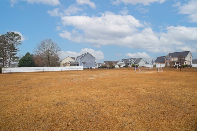 Building Photo - "Charming 4-Bedroom Home with Granite Coun...