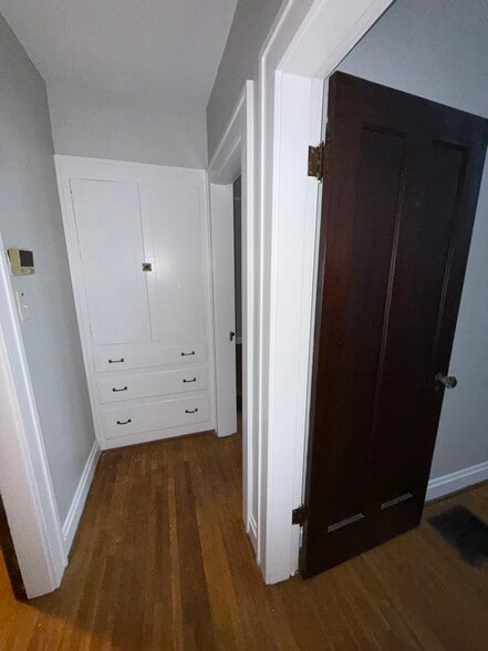 Hallway with built in linen closet - 40 W Tompkins St