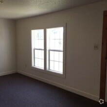 Building Photo - UPDATED HOME WITH 2 BEDROOMS