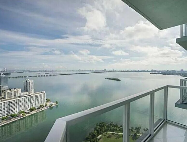 Wrap around balcony with panoramic views of Biscayne Bay. - 1900 N Bayshore Dr