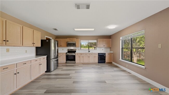 Building Photo - 7338 Raintree Forest