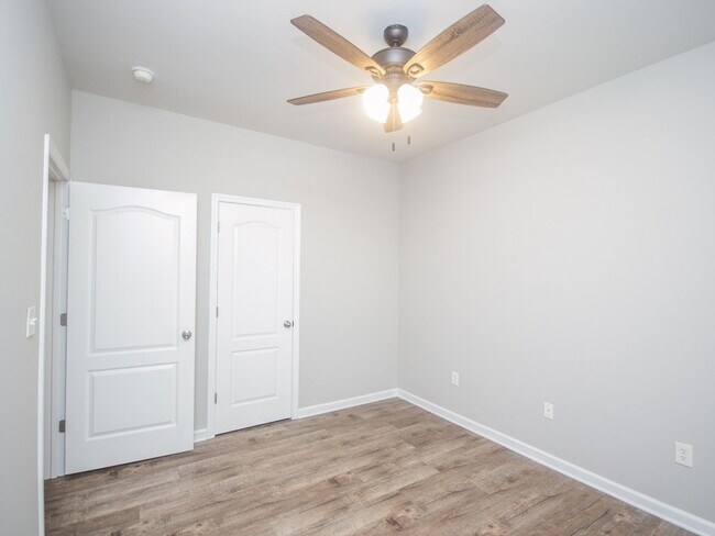 Building Photo - Gorgeous Corner-Lot Home in Canebrake Club – Lawn Care Included