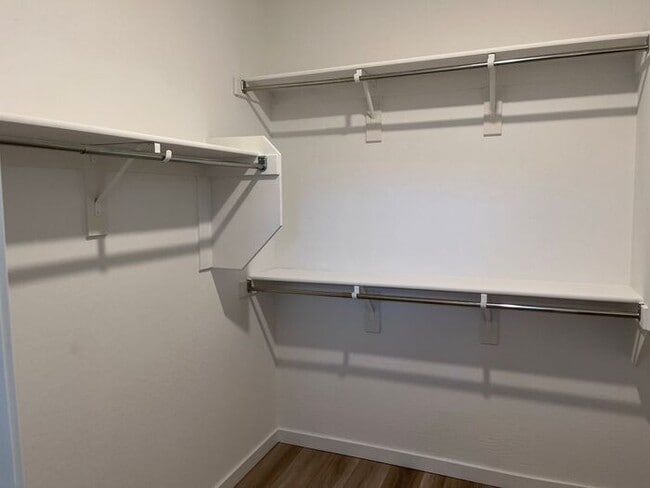 Building Photo - TOWN HOME WITH COMMUNITY POOL , GATED COMM...