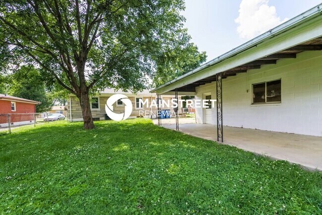 Building Photo - 8003 Canna Dr