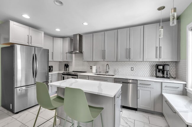 Building Photo - Furnished 4-Bedroom Home with a Private Pool near Elmwood Village