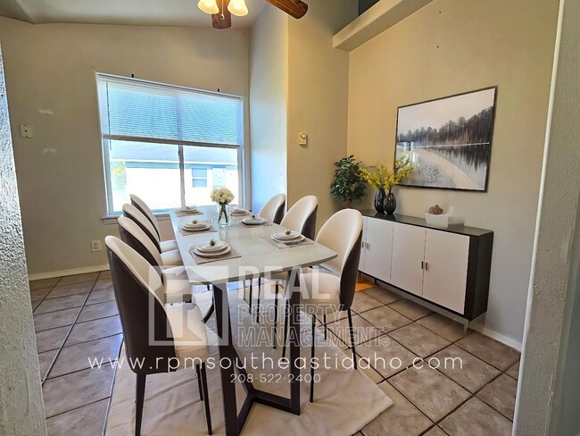 Building Photo - Spacious & Updated 2 Bedroom, 2 Bathroom Twin Home in Ammon with Garage, Fenced Backyard, and Hoo...