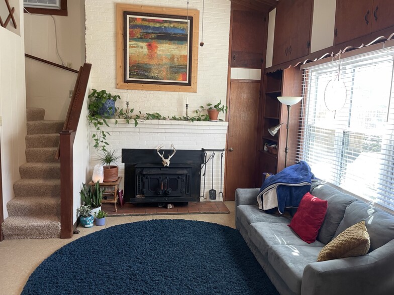 Living area with wood stove - 137 Oak St