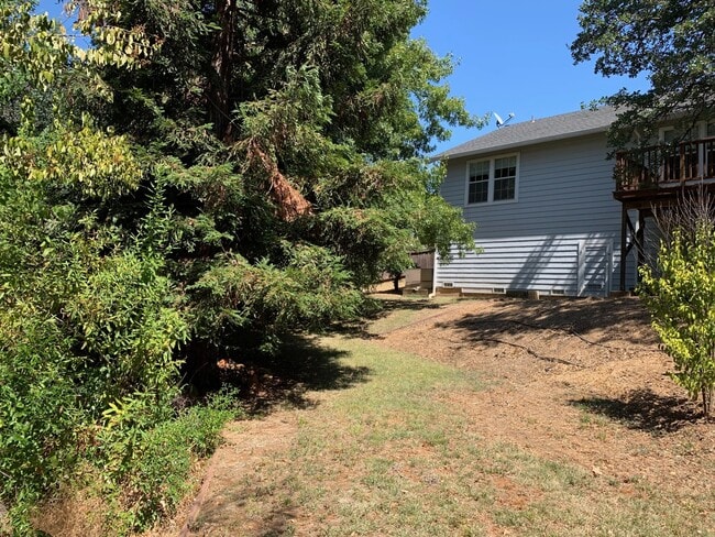 Building Photo - Spacious 3-Bedroom Home with Greenbelt Views & Landscaping Included