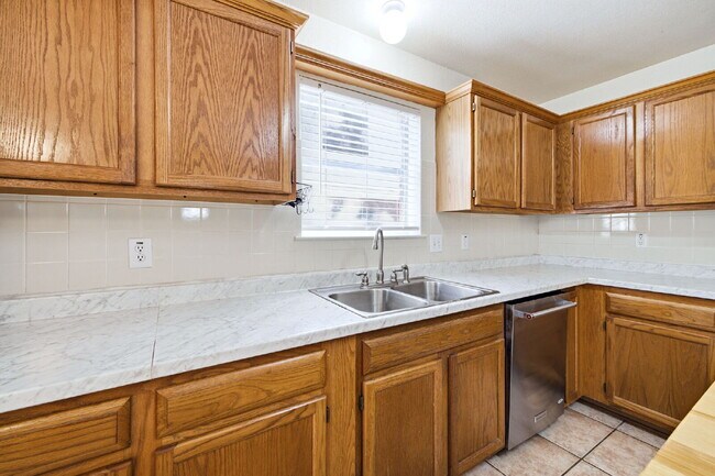 Building Photo - 4 Bedroom home with ZERO carpet close to RAFB