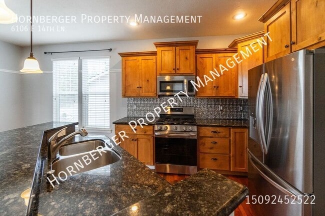 Building Photo - 6106 E 14th Ln