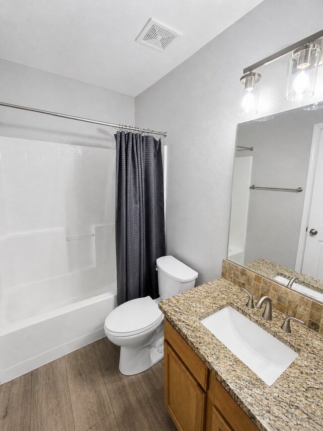 Building Photo - Spacious Home with 3-Car Garage, Two Living Areas & Covered Patio