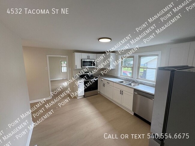 Building Photo - 4532 Tacoma Ave NE
