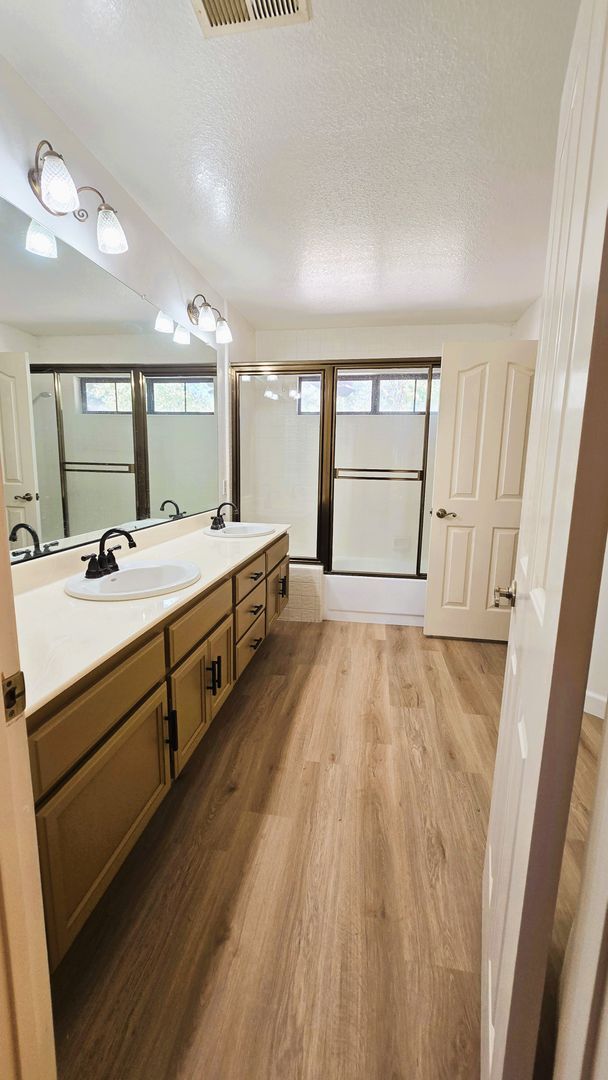 Building Photo - "Spacious, Sunlit Home in a Peaceful Ranch...