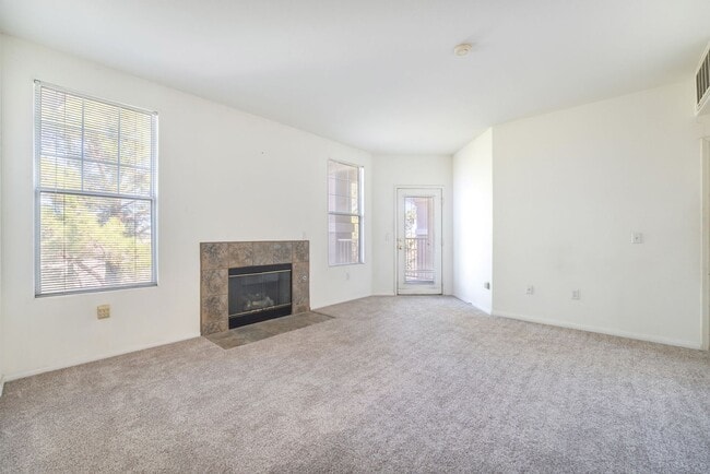 Building Photo - Spacious 3-Bedroom Condo with Garage and Two Private Patios!