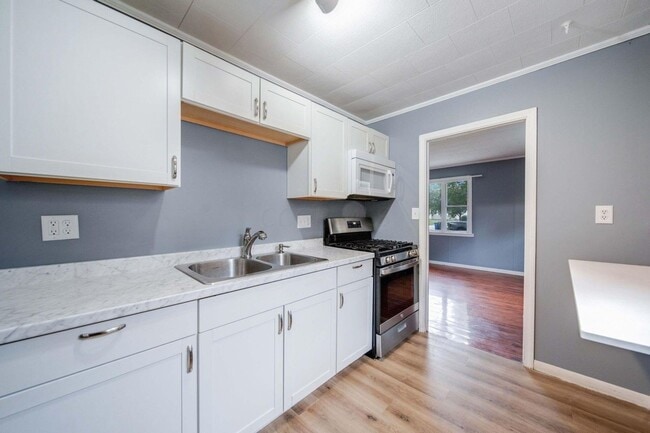 Building Photo - Affordable 3-Bedroom Home with Covered Pat...
