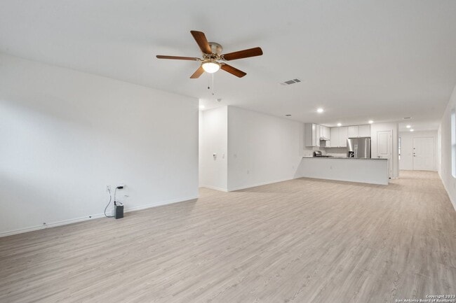 Building Photo - This beautiful single-story home has 4 bedrooms, 2 baths, vinyl flooring throughout, an open floo...