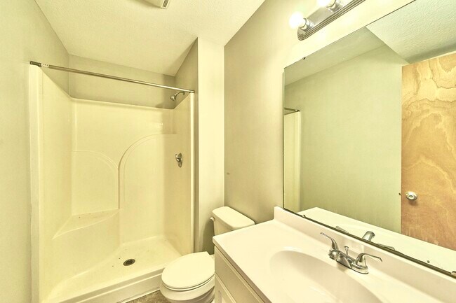 downstairs bathroom with shower - 1080 Fairlane Ct