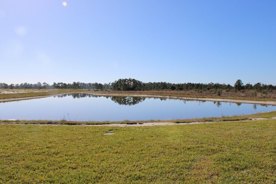 Building Photo - Brand New Construction in Lehigh Acres at Savanna Lakes MOVE IN SPECIAL FIRST MONTH RENT FREE! AP...