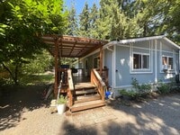 Building Photo - Charming 2 bedroom 2 bath house in Nisqual...