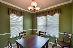 Building Photo - Former model home on corner lot is ready for move in!