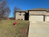 Building Photo - Beautiful 3 bedroom, 2 bath, 2 car garage duplex in Ozark! Spacious, granite with open / split be...