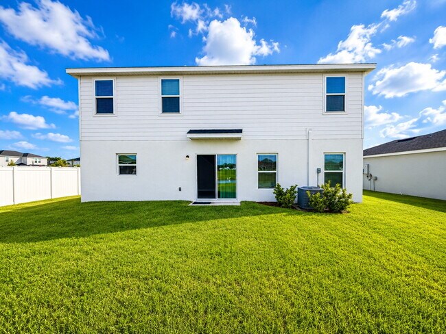 Building Photo - Available Now! Stunning 2025-Built 4BR/2BA South Lakeland Home with Office, Loft, and EV Charger!