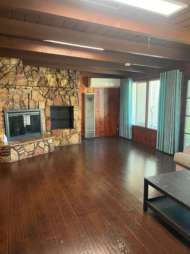 Building Photo - Home with a Cabin Style Family room and backyard Oasis