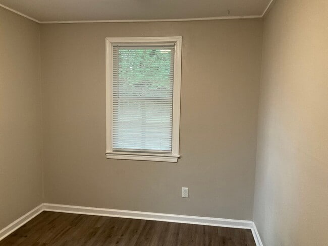 Building Photo - This two bedroom one bath duplex is centrally located. Just minutes to area bases, beaches, shopp...